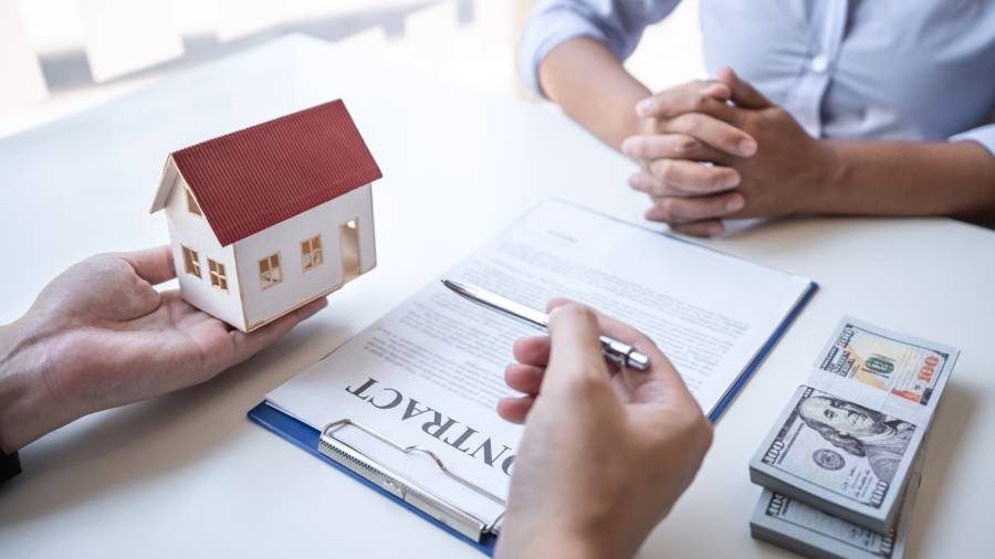 Women meeting with real estate agent to explore home buying and investment opportunities