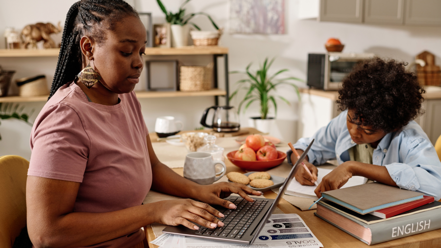 A mother spending time with her children, representing financial stability and legacy building